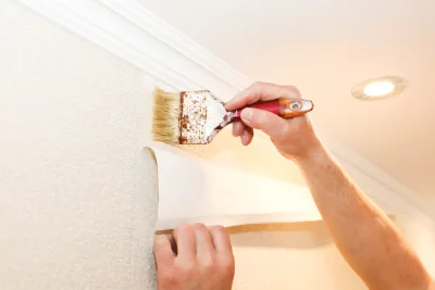 Pose de papier peint au Breuil-sur-Couze — revêtements muraux et toiles de verre